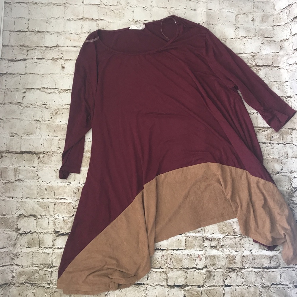 NWOT Boutique top! Never worn! Longer fit